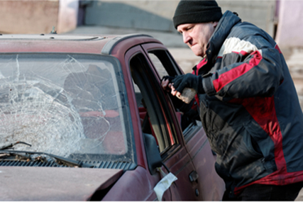 hooligan-smashing-windshield